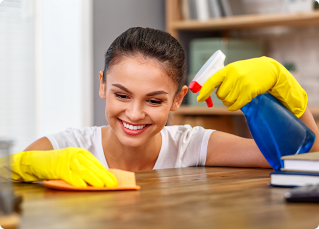 Spokane Services Cleaning Girl Wiping a Table