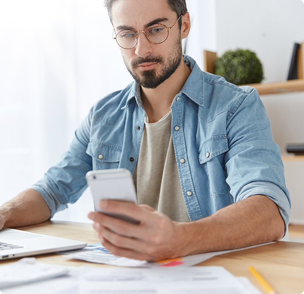 Man looking at his smartphone